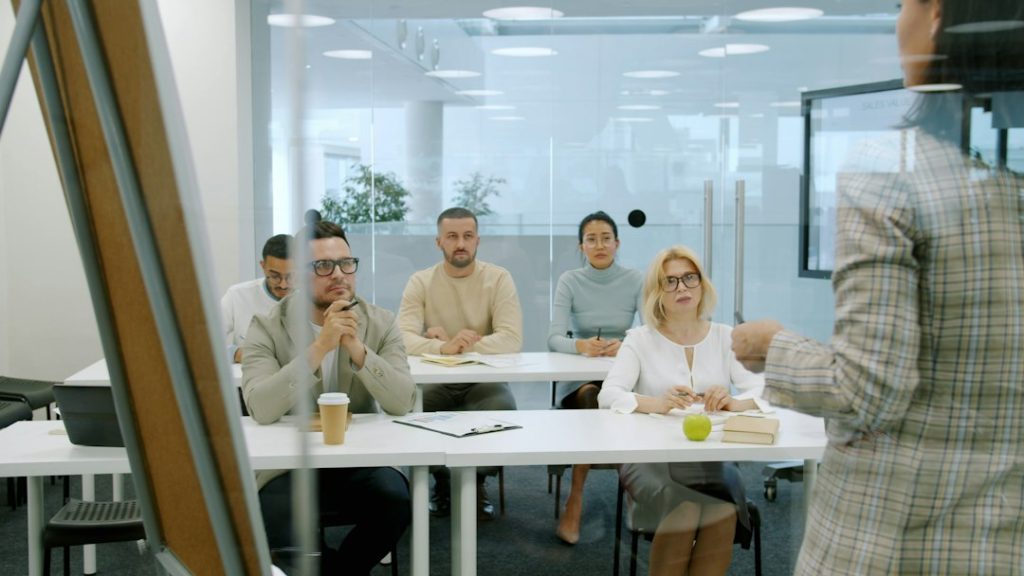Business people attending a presentation in a modern office